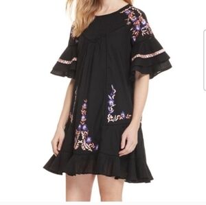 Free People Pavlo Babydoll Mini Dress in black featuring floral embroidery Small